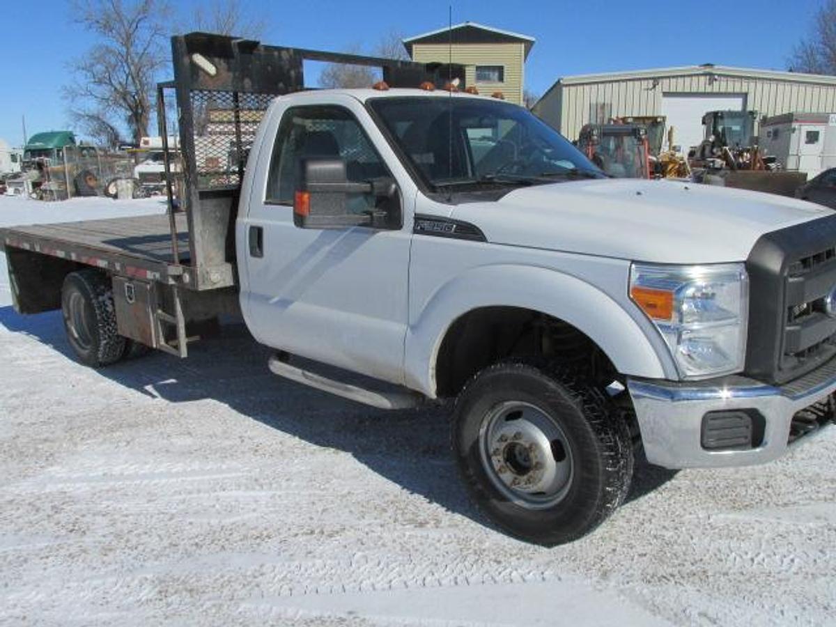 Used 2016 Ford F350 Regular Cab 4x4 with flat deck