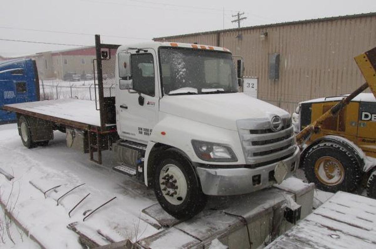 Used 2019 Hino 338 with hydraulic brakes and 22 ft flat deck
