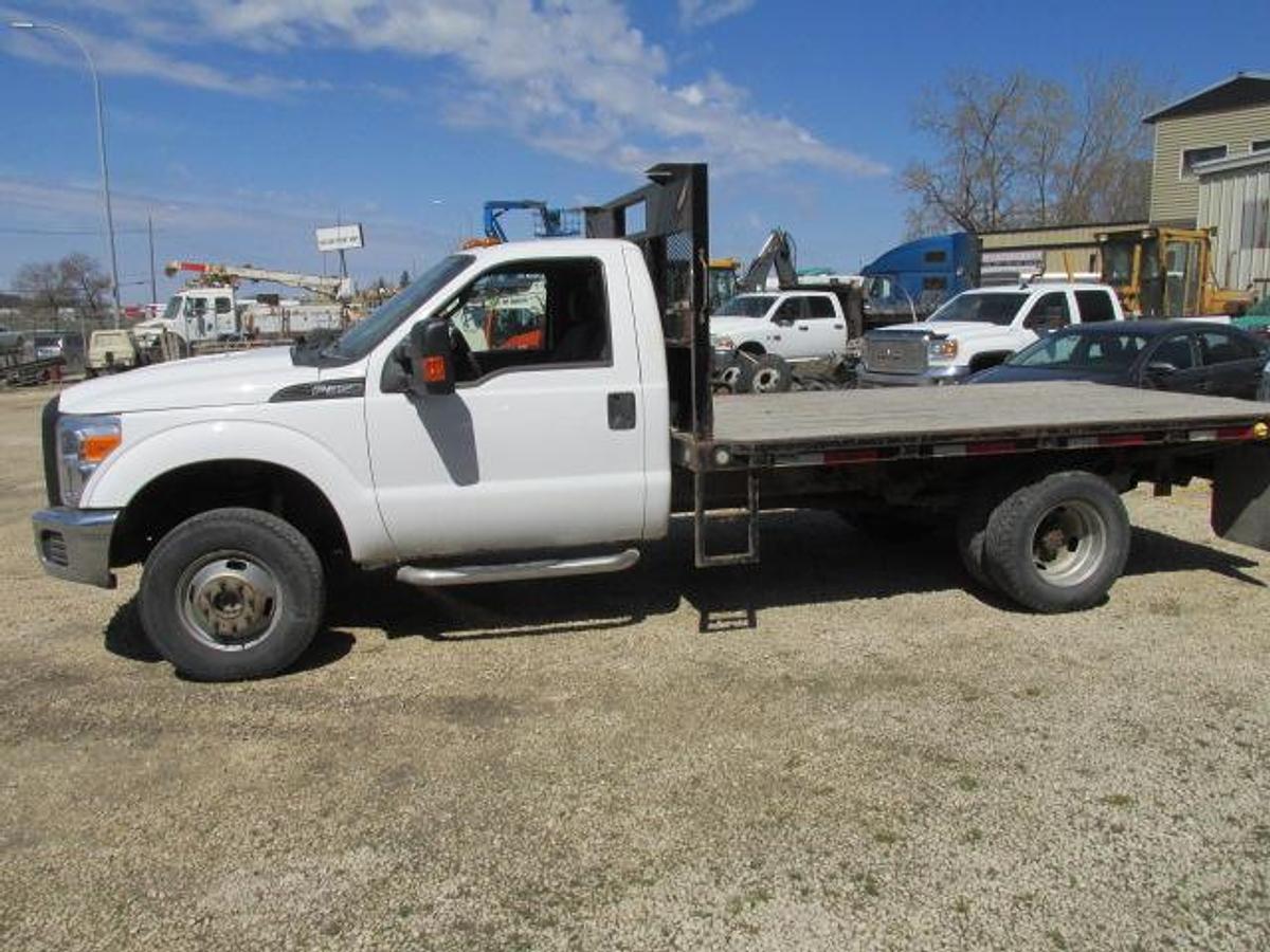 Used 2016 Ford F350 Regular Cab 4x4 with flat deck