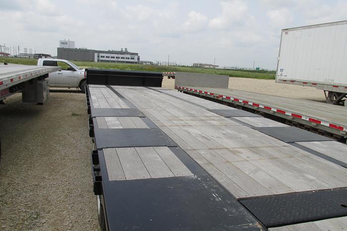 Used 2023 BWS 53 ft step deck equipment trailer with air ramps and air ramp on to kick