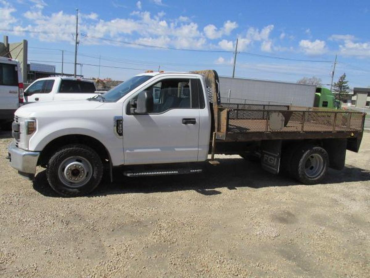 Used 2018 Ford F 350 with 12 ft flat deck