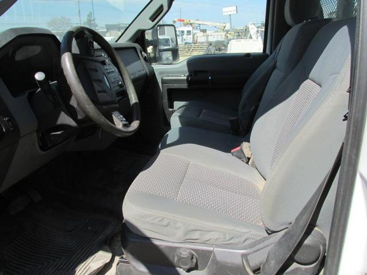 Used 2016 Ford F350 Regular Cab 4x4 with flat deck