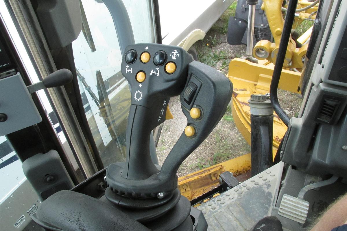 Used 2017 Caterpillar 140 M AWD with Snow wing, front lift group and rear ripper