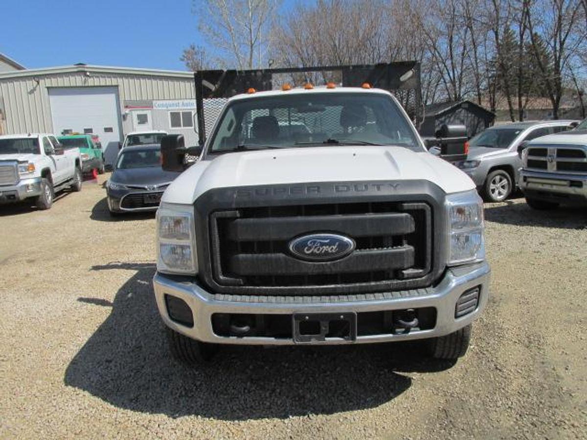 Used 2016 Ford F350 Regular Cab 4x4 with flat deck