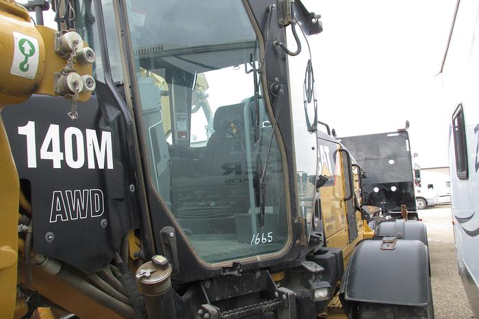 Used 2017 Caterpillar 140 M AWD with Snow wing, front lift group and rear ripper