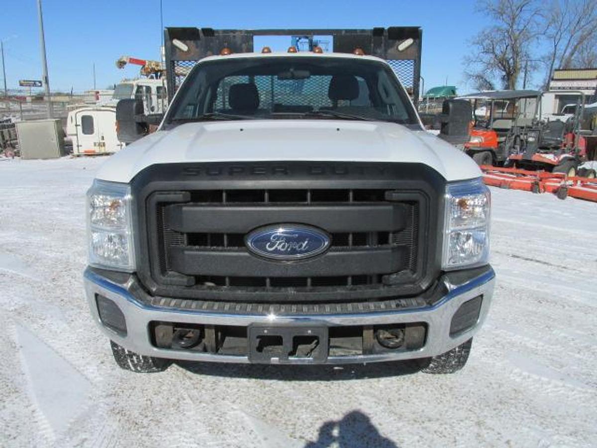 Used 2016 Ford F350 Regular Cab 4x4 with flat deck