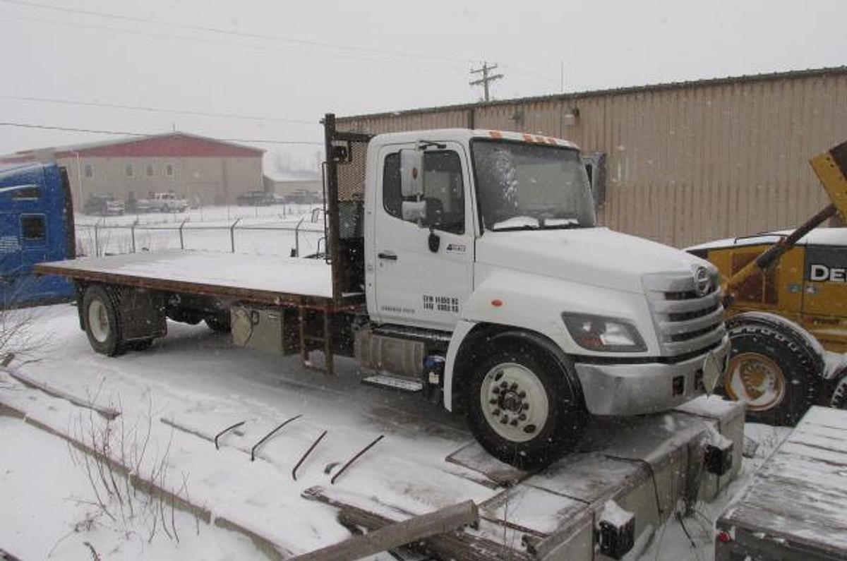 Used 2019 Hino 338 with hydraulic brakes and 22 ft flat deck
