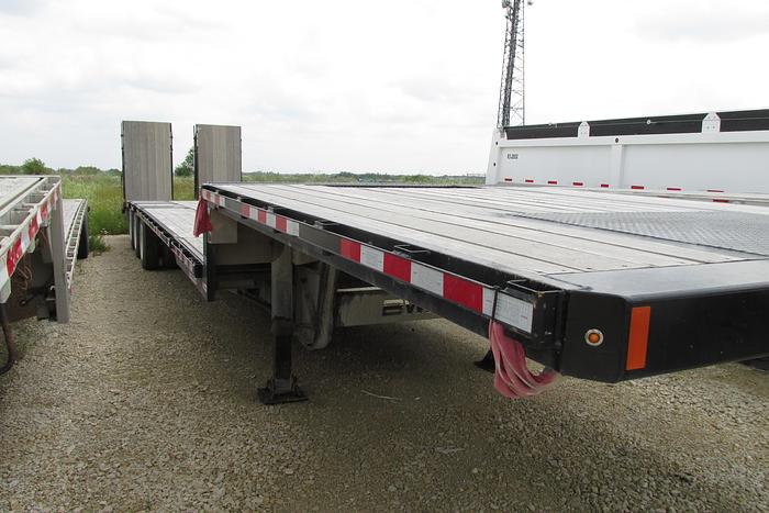 Used 2023 BWS 53 ft step deck equipment trailer with air ramps and air ramp on to kick