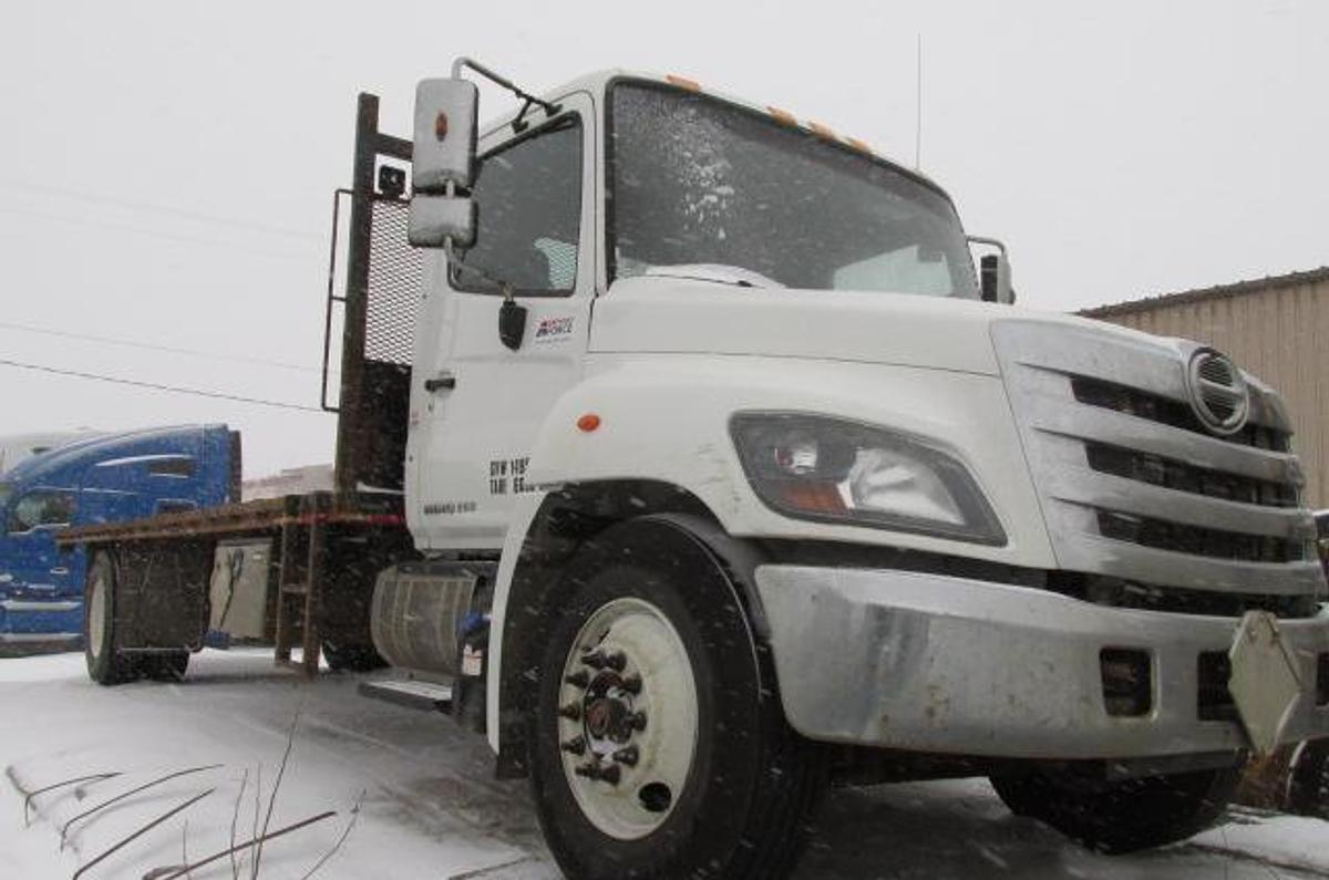 Used 2019 Hino 338 with hydraulic brakes and 22 ft flat deck