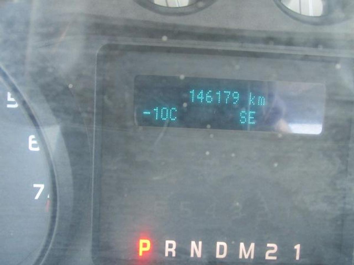 Used 2016 Ford F350 Regular Cab 4x4 with flat deck