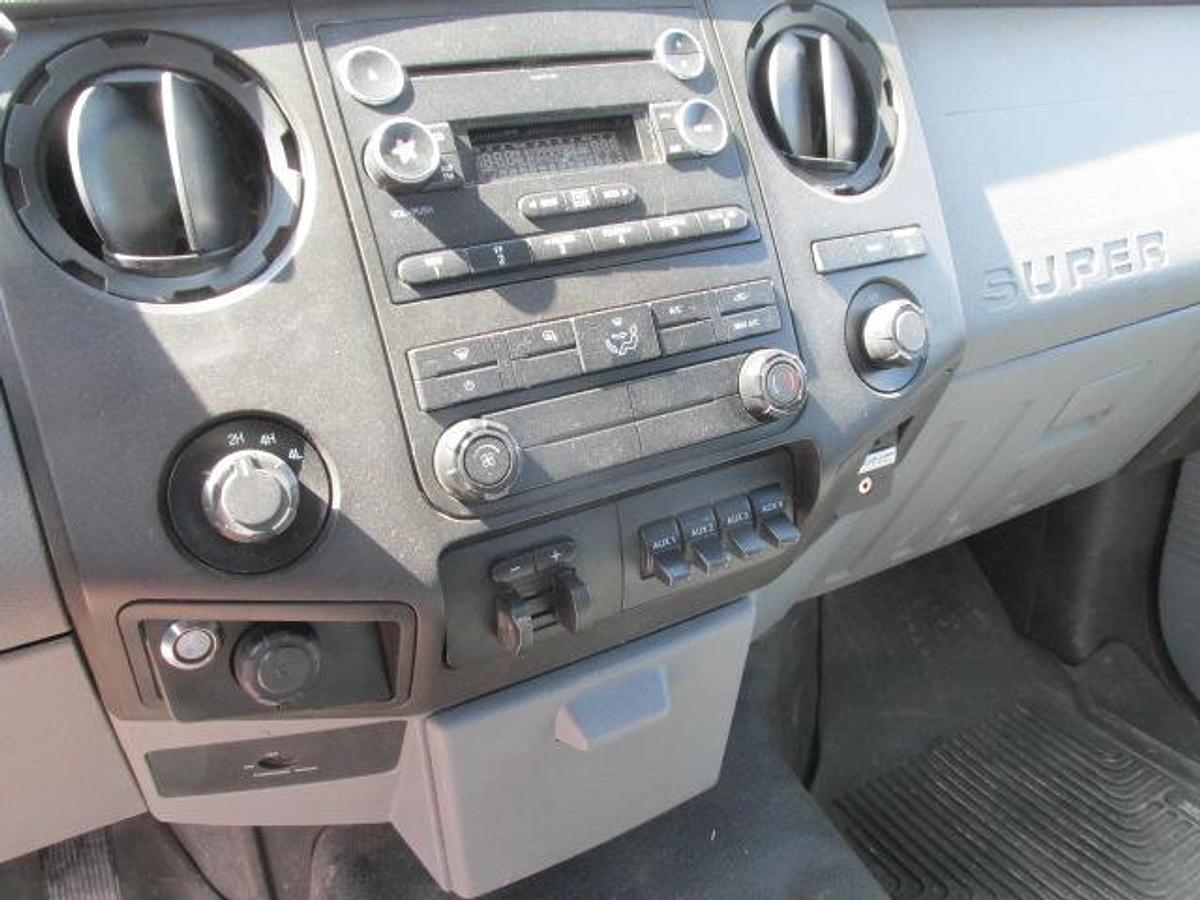 Used 2016 Ford F350 Regular Cab 4x4 with flat deck