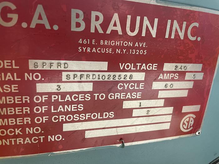 Used 2002 Braun rear discharge small piece folder