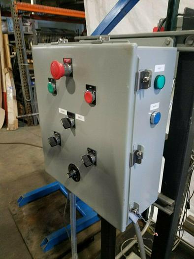 Used Rapid Motorized Double Sided Stock Reel Material Feed with control panel