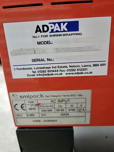 Used Adpak s560 chamber sharing wrap machine