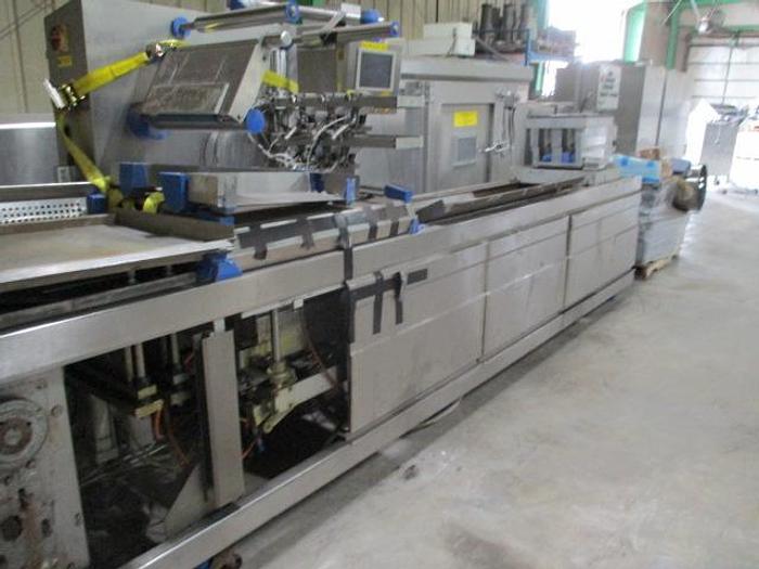 Used 2008 REPAK ROLLSTOCK PACKAGER, 18" WIDE BETWEEN CHAINS, 220 VOLT, BUILT 2008 RE-20