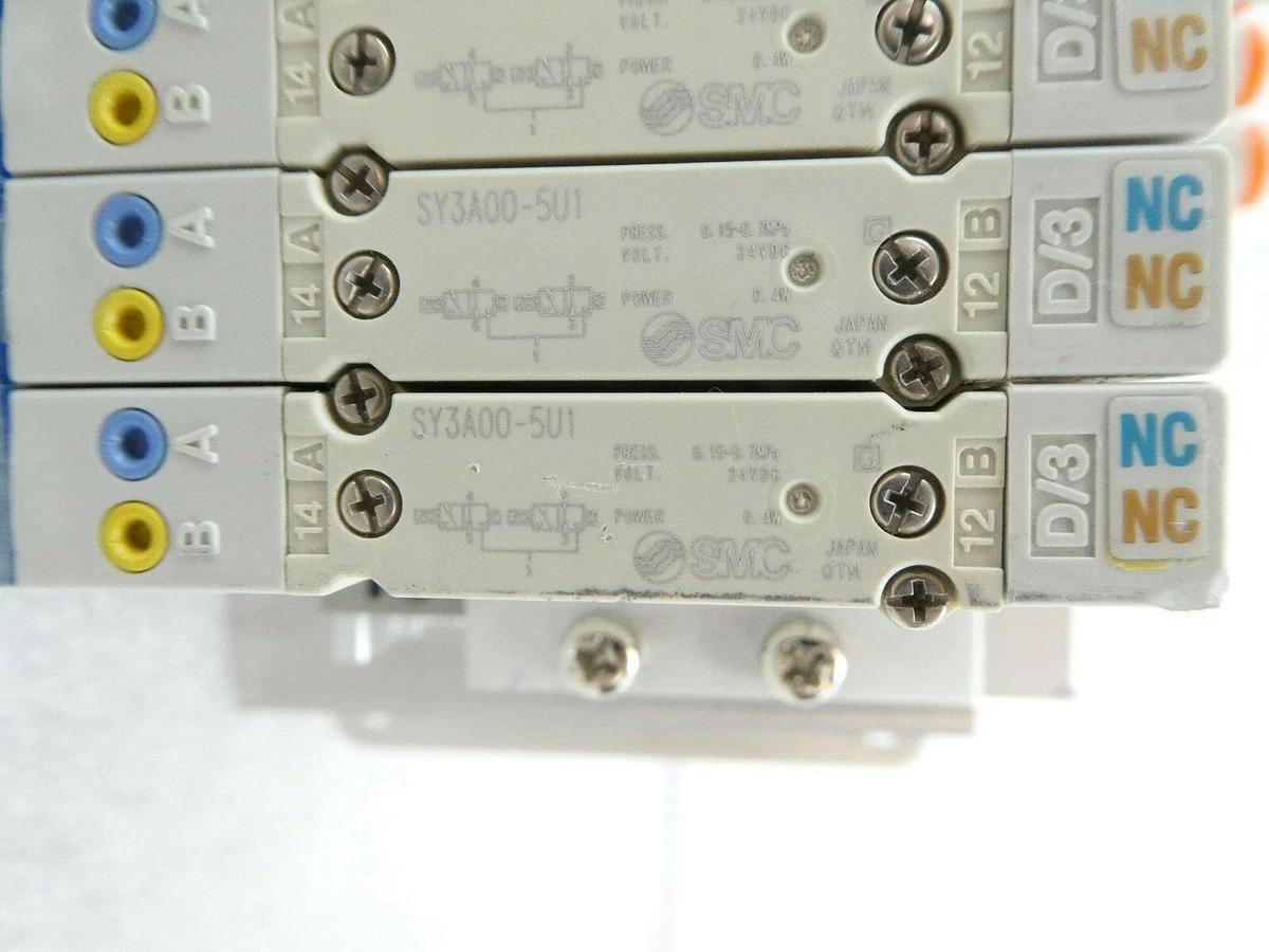 Used AMAT Applied Materials Pneumatic Block SMC 16-Port Manifold INR587-33 Surplus