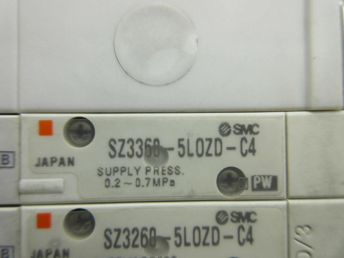 Used SMC 6-Port Pneumatic Manifold SZ3260-5LOZD-C4 SZ3360-5LOZD-C4 Lot of 2 Used
