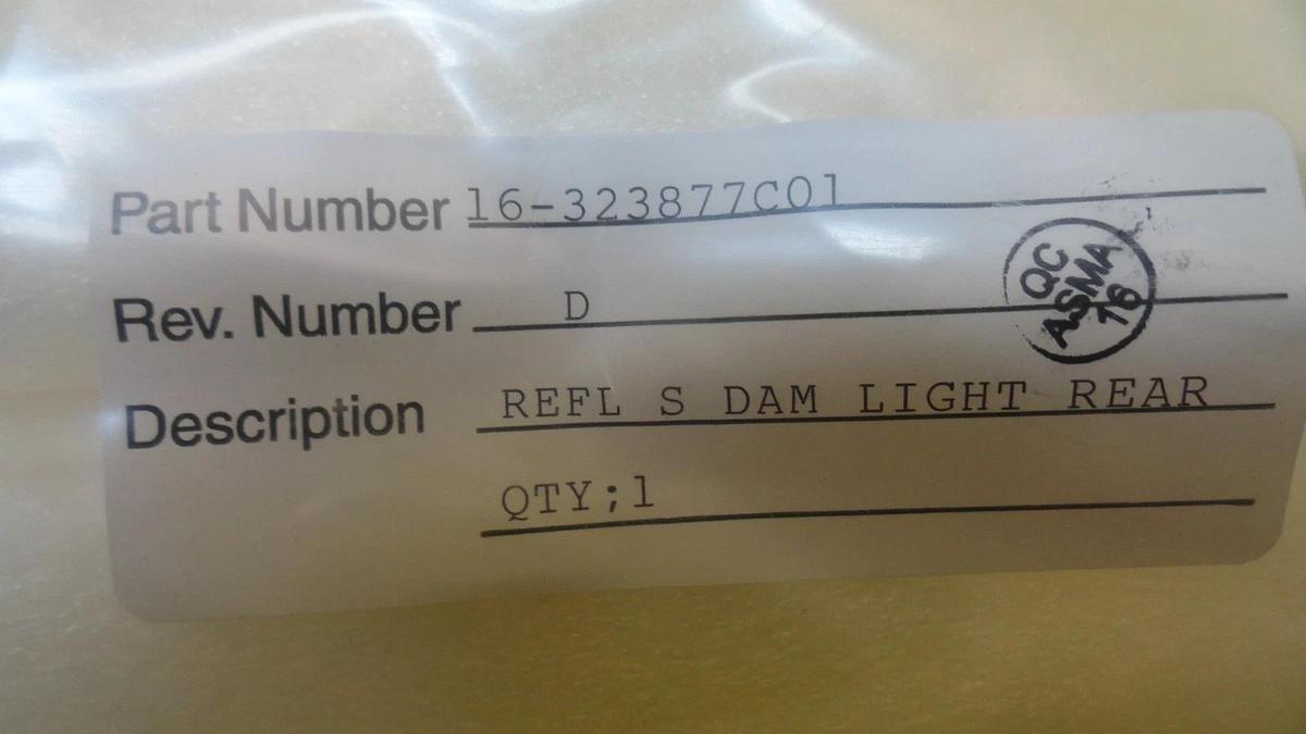 ASM 16-323877C01 REFL-S-DAM-LIGHT-REAR