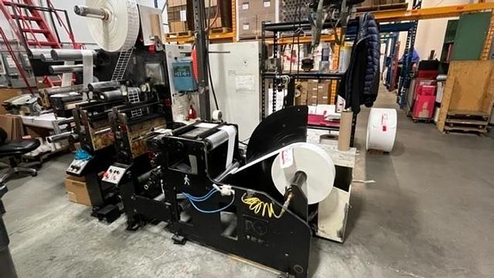 Used 13" WIDE ROTOFLEX SLITTER REWINDER WITH 2 STATION DIE CUTTING