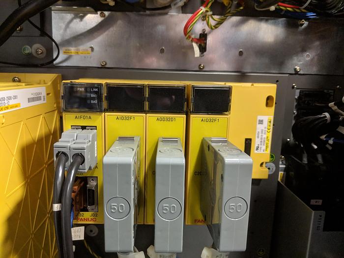 Used 2012 FANUC M710iC/50 6 AXIS ROBOT WITH IR VISION AND R30iA CONTROLLER.