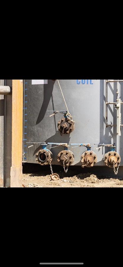 Used 2012 Dragon 400BBL Vertical Skidded Slope Bottom Tanks