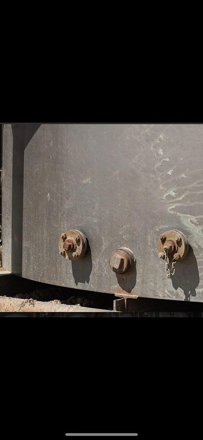 Used 2012 Dragon 400BBL Vertical Skidded Slope Bottom Tanks