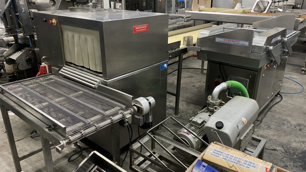 Used Webomatic vacuum line