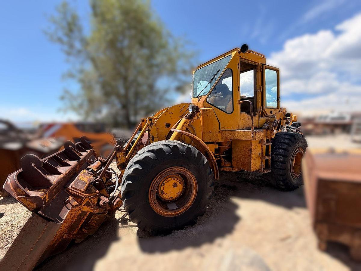Used Cat 950 Loader with side dump trench bucket