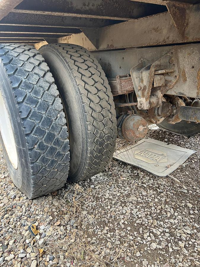 Used 1990 International 8300 Eagle Flatbed Dump Truck, Stake Body. flatbed