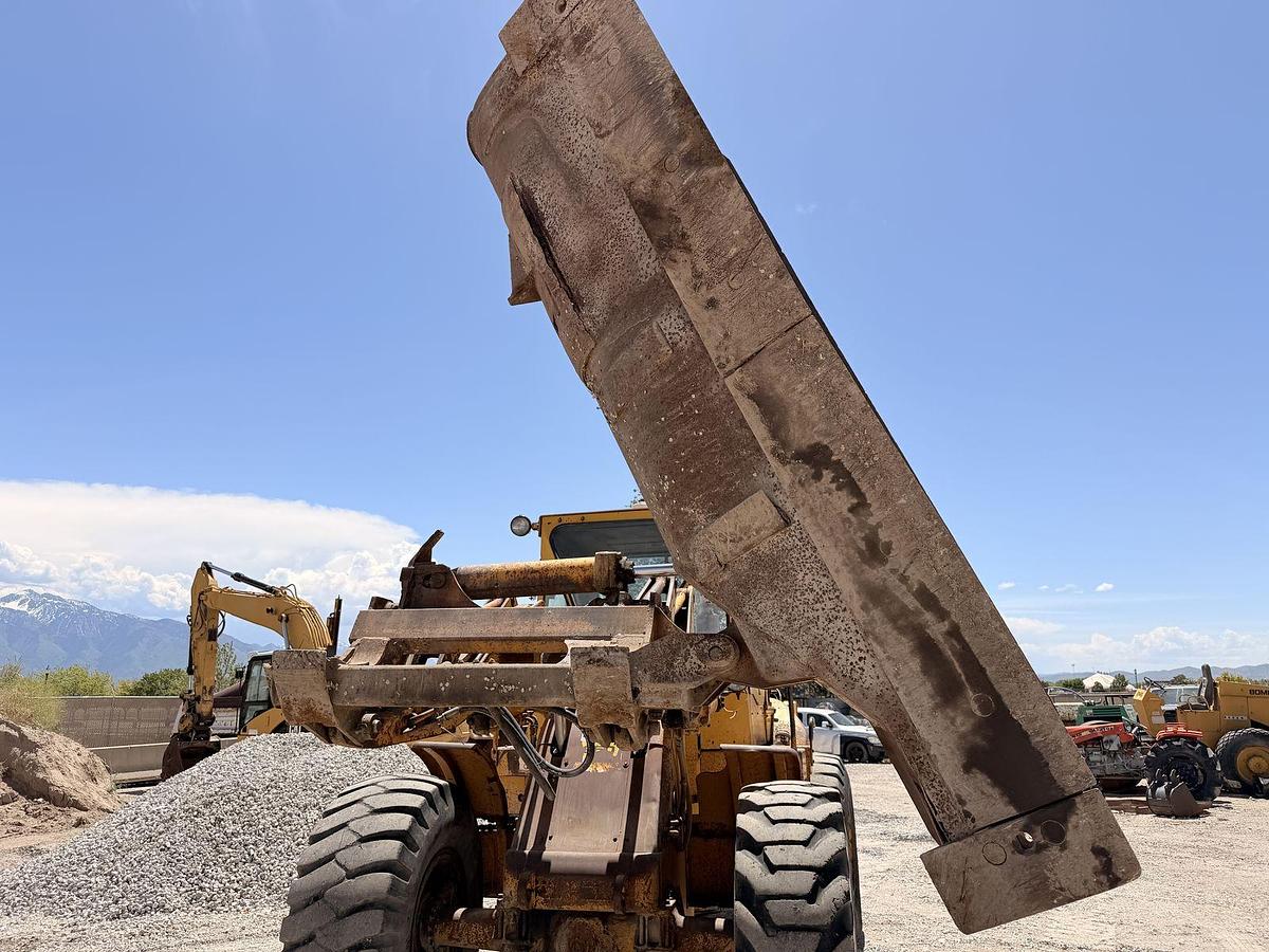 Used Cat 950 Loader with side dump trench bucket