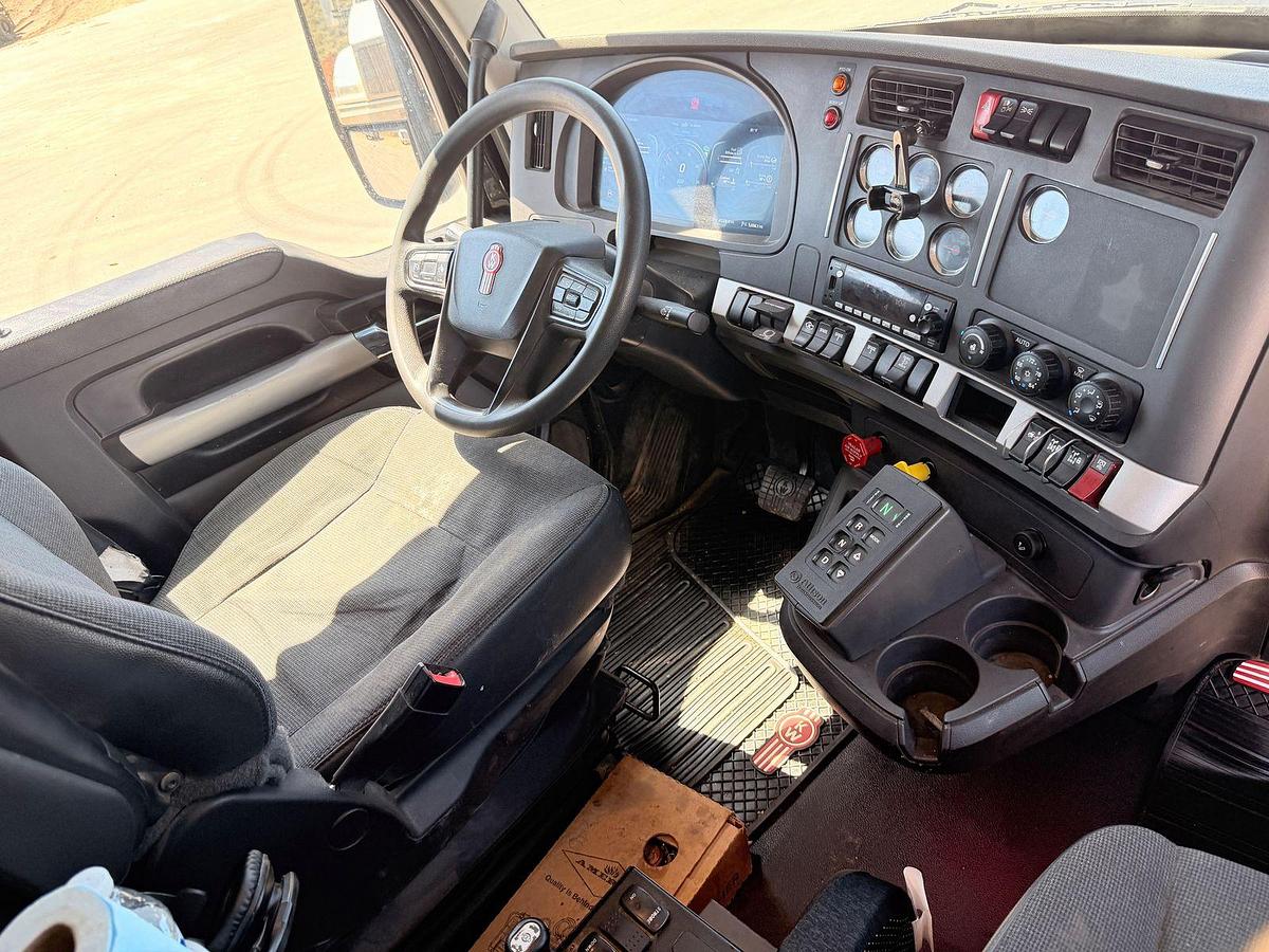 Used 2023 Kenworth T880 tri-axle dump truck, 123,870 miles
