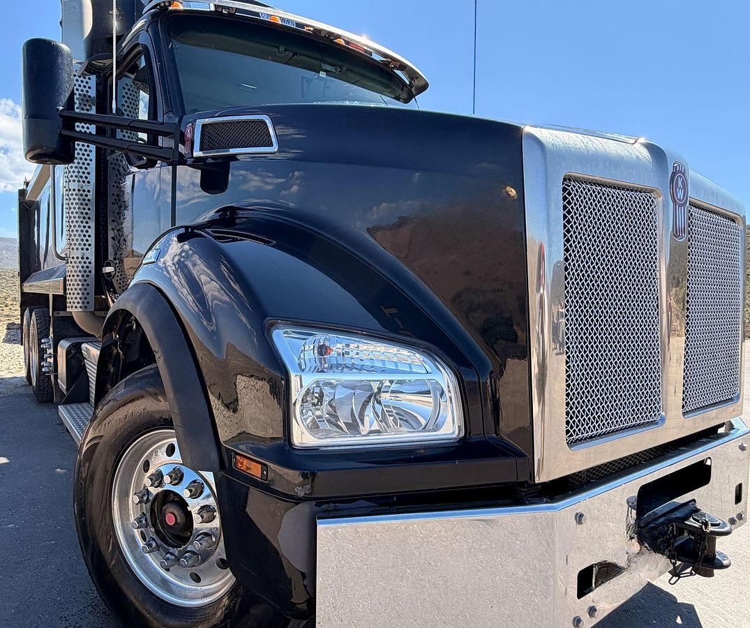 Used 2023 Kenworth T880 tri-axle dump truck, 123,870 miles