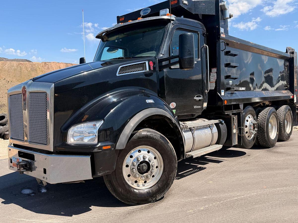 Used 2023 Kenworth T880 tri-axle dump truck, 123,870 miles