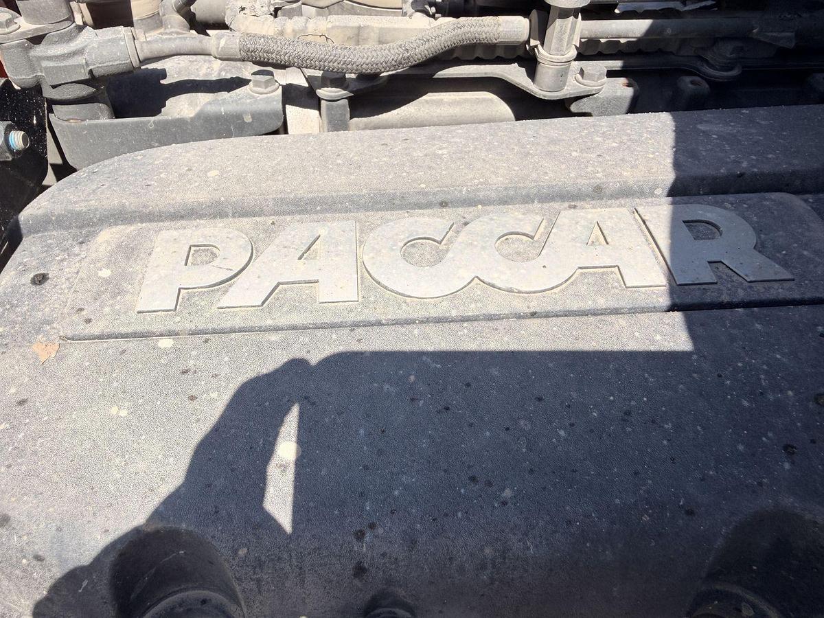 Used 2023 Kenworth T880 tri-axle dump truck, 123,870 miles