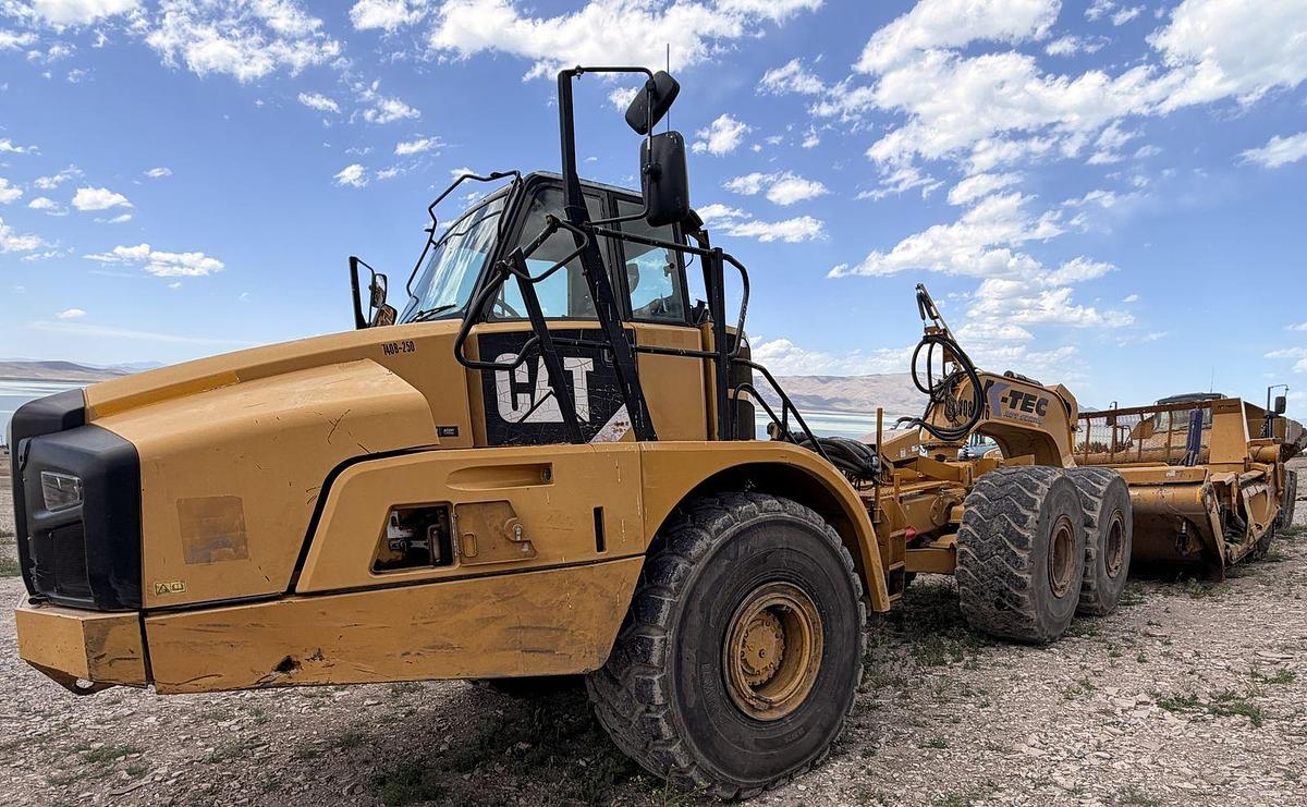 Used Caterpillar 740B, articulated dump truck with KTec Scraper