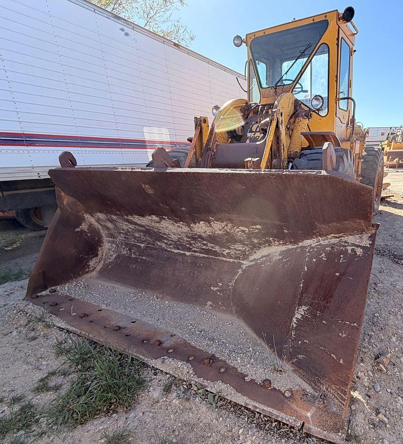 Used Cat 950 Loader with side dump trench bucket