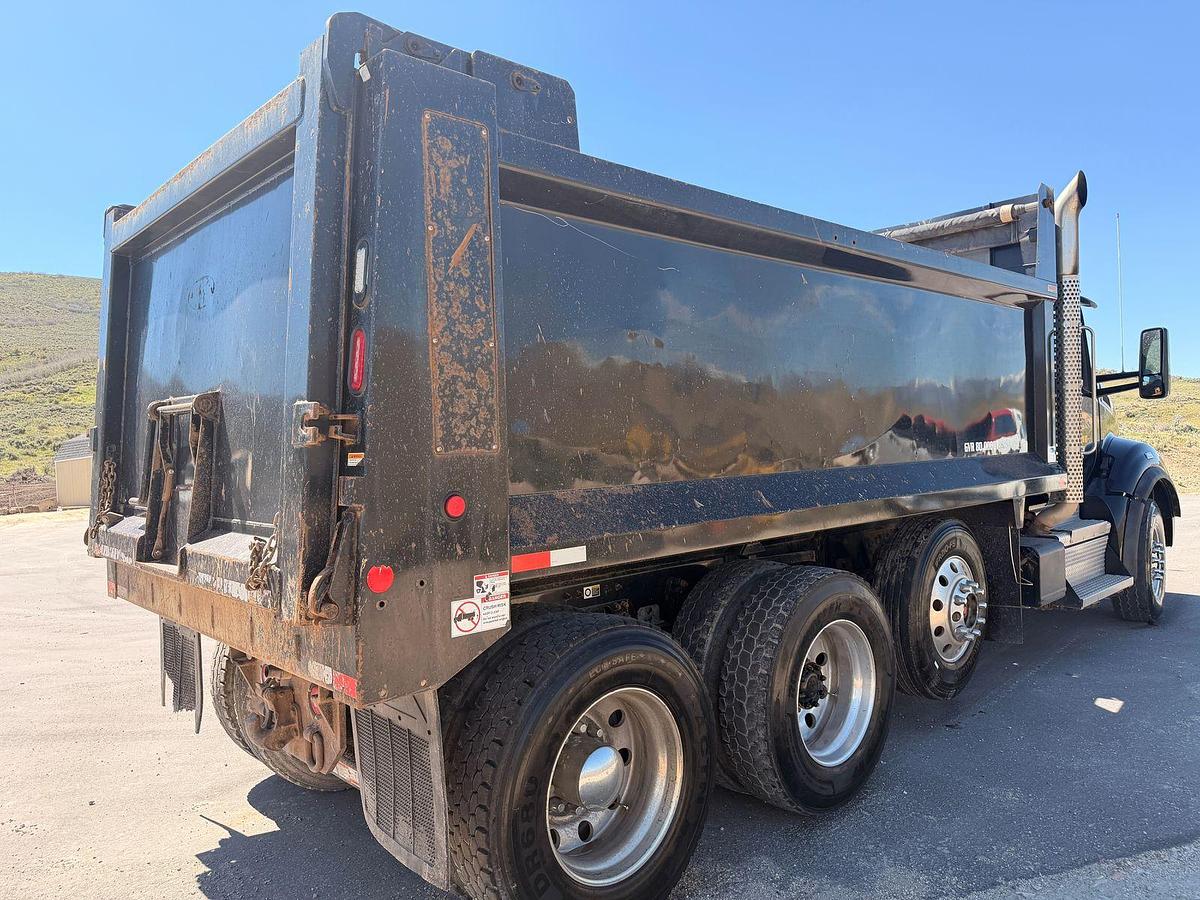 Used 2023 Kenworth T880 tri-axle dump truck, 123,870 miles