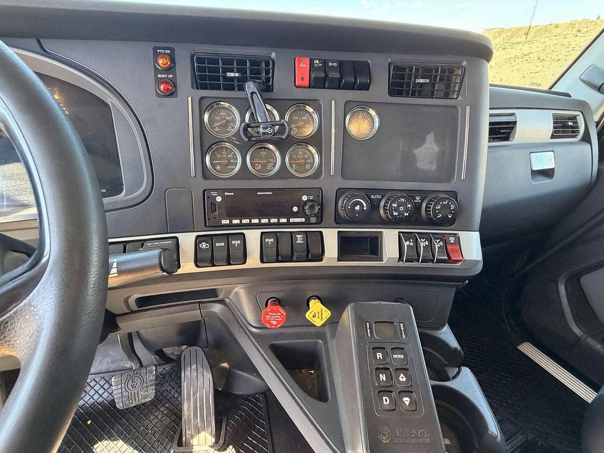Used 2023 Kenworth T880 tri-axle dump truck, 123,870 miles