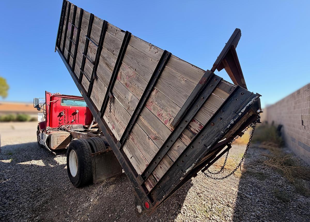 Used 1990 International 8300 Eagle Flatbed Dump Truck, Stake Body. flatbed
