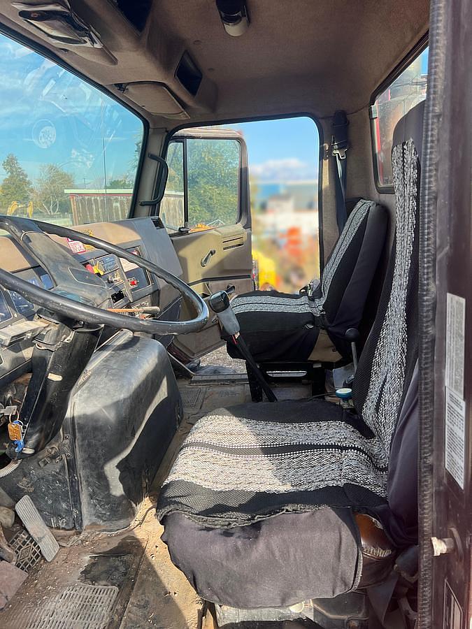 Used 1990 International 8300 Eagle Flatbed Dump Truck, Stake Body. flatbed