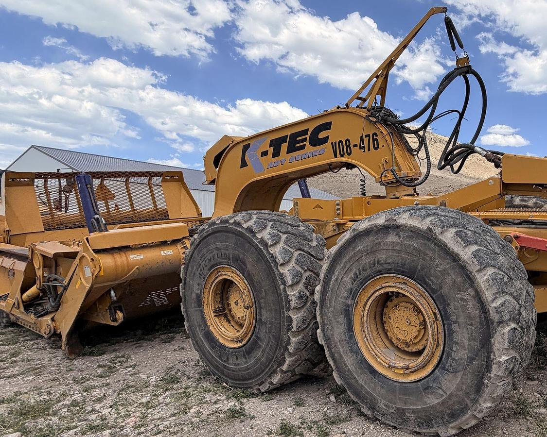 Used Caterpillar 740B, articulated dump truck with KTec Scraper