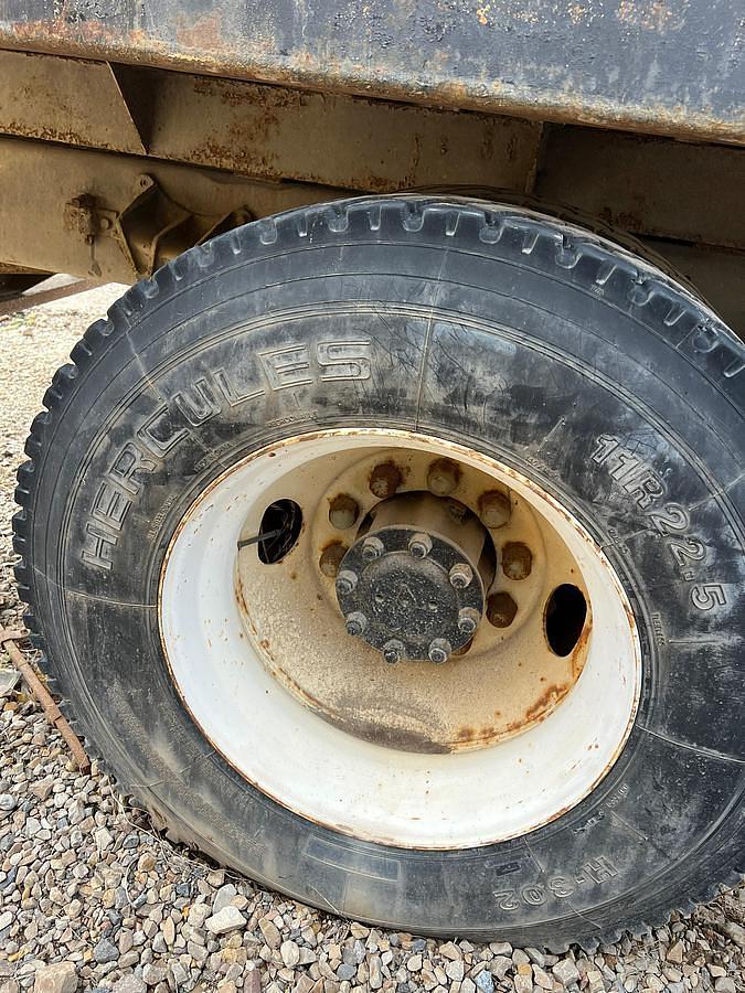 Used 1990 International 8300 Eagle Flatbed Dump Truck, Stake Body. flatbed