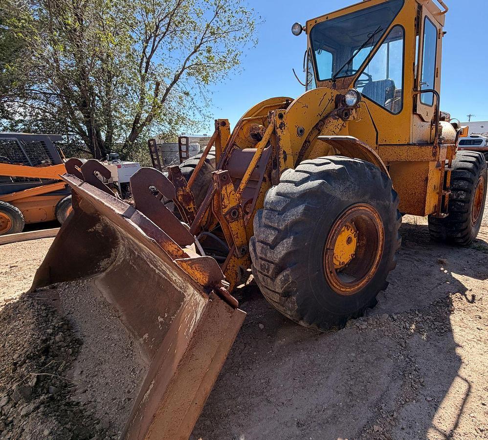 Used Cat 950 Loader with side dump trench bucket