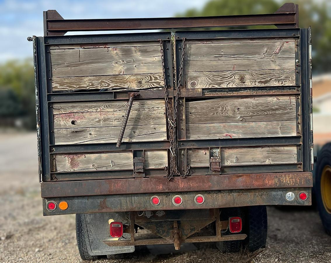 Used 1990 International 8300 Eagle Flatbed Dump Truck, Stake Body. flatbed