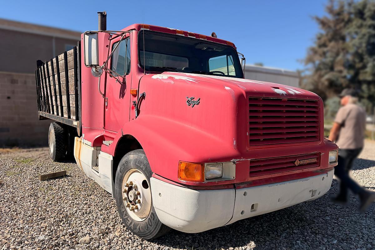 Used 1990 International 8300 Eagle Flatbed Dump Truck, Stake Body. flatbed