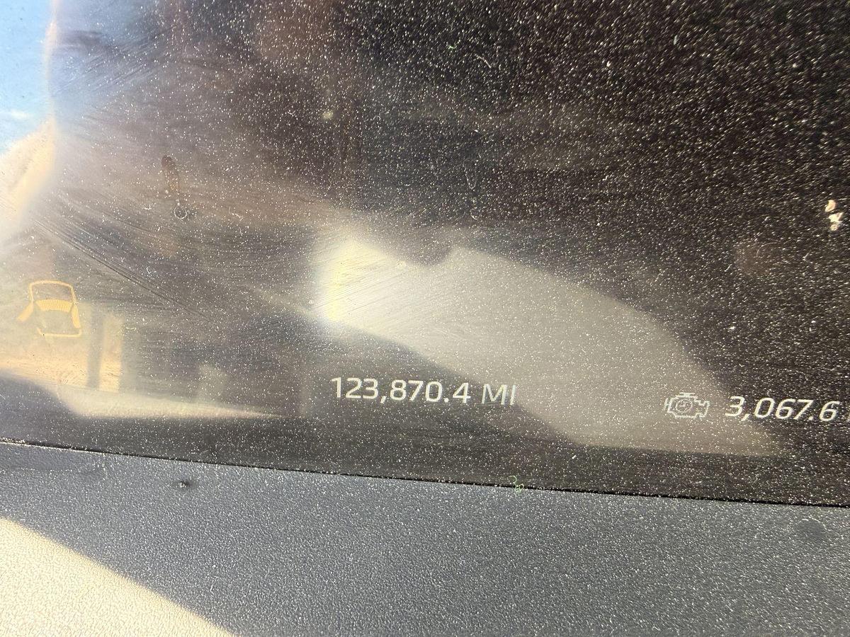 Used 2023 Kenworth T880 tri-axle dump truck, 123,870 miles