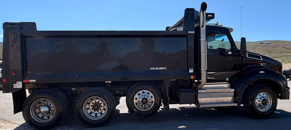 Used 2023 Kenworth T880 tri-axle dump truck, 123,870 miles