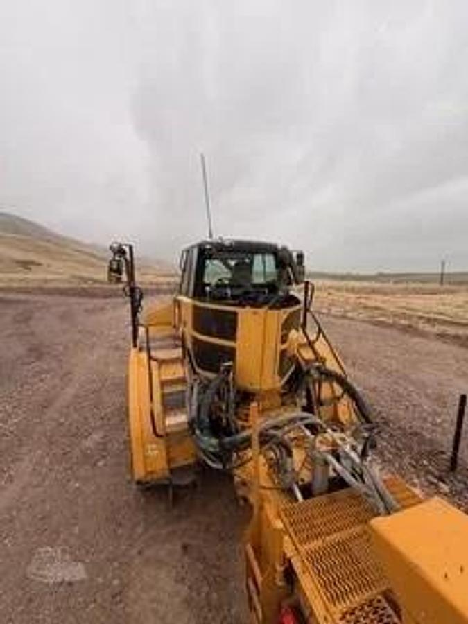 Used Caterpillar 740B, articulated dump truck with KTec Scraper