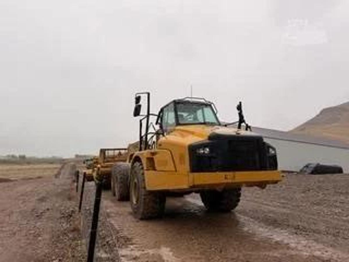 Used Caterpillar 740B, articulated dump truck with KTec Scraper