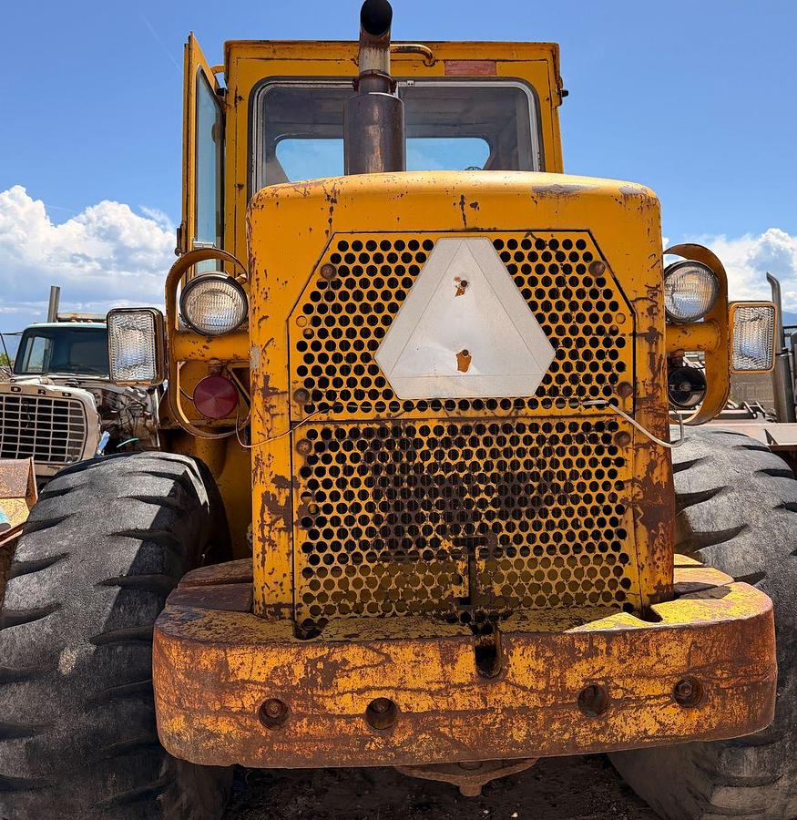 Used Cat 950 Loader with side dump trench bucket